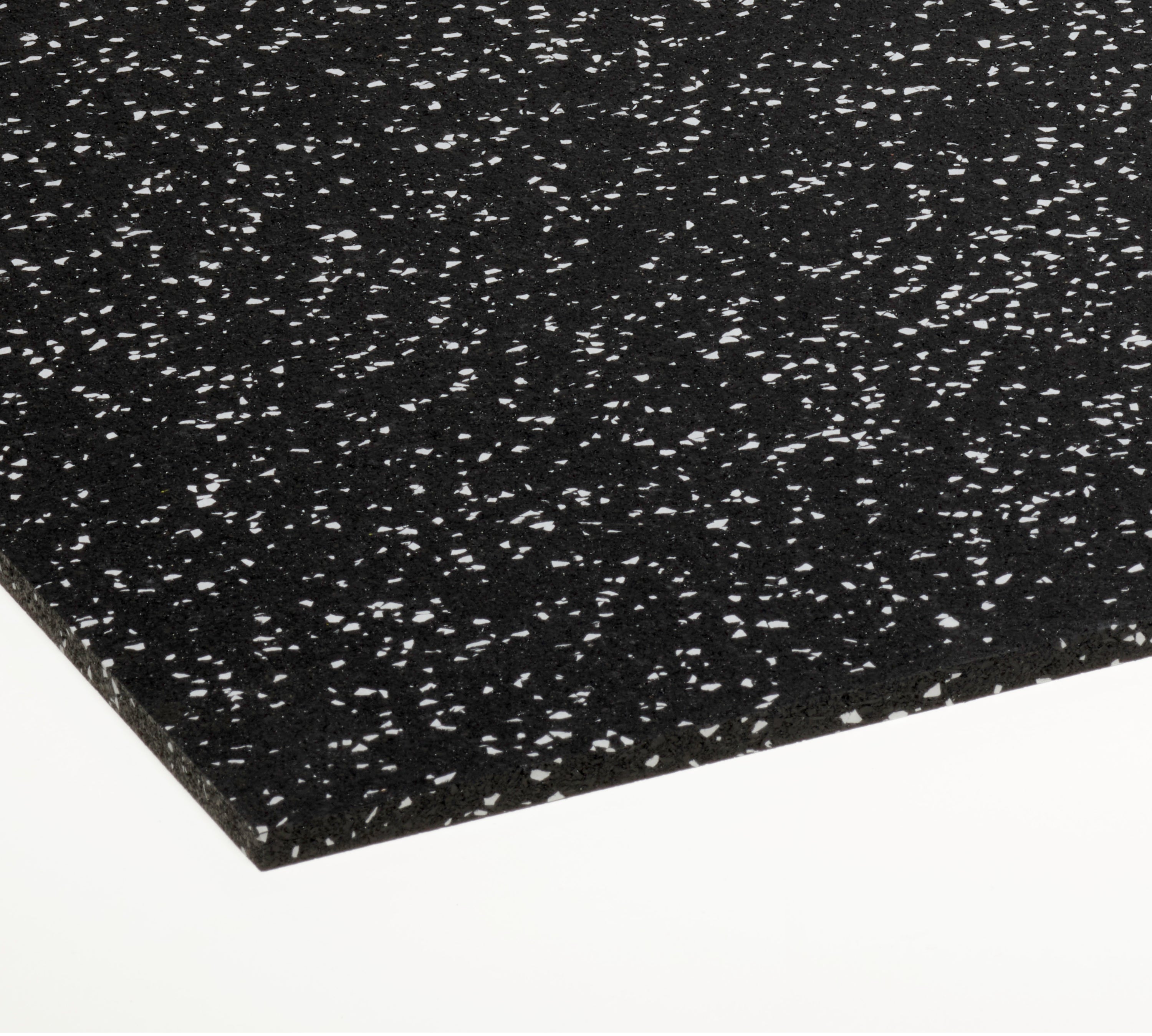 Black gym flooring with white speckles on a white background