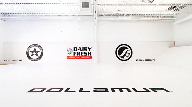 Daisy Fresh Jiu Jitsu tapped Dollamur for custom white FLEXI-Connect martial arts roll mats and wall pads for its location in Denton, TX