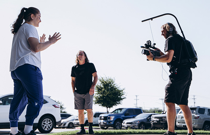 The FloSports team interviews Amit Elor at Dollamur headquarters